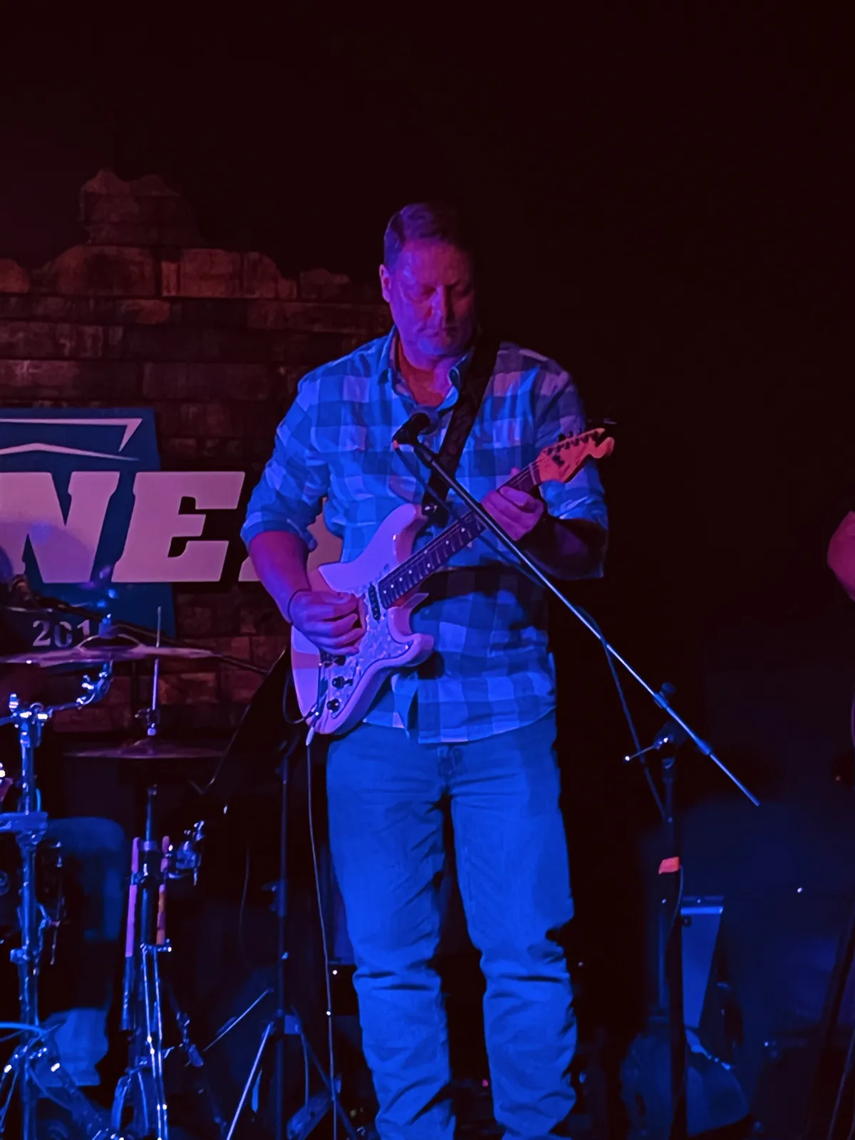 One More Round live performance and band photo
