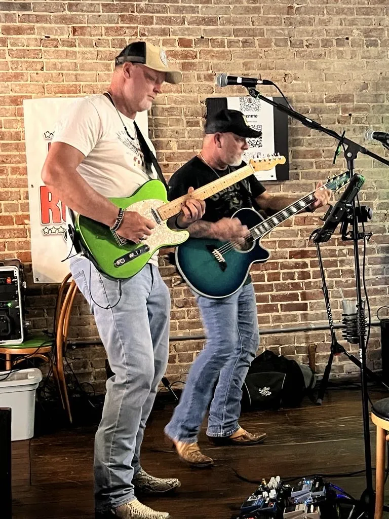 One More Round live performance and band photo