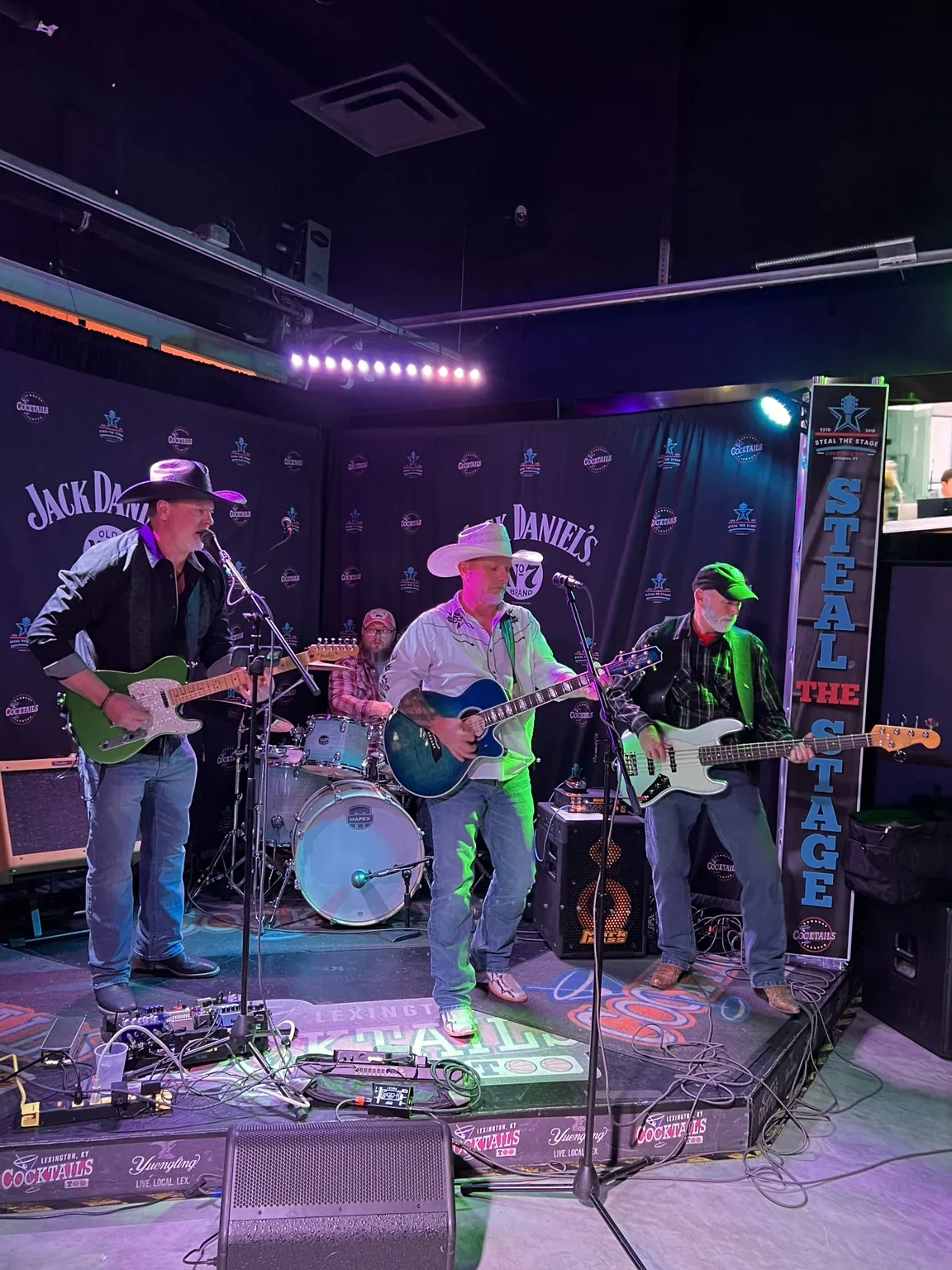 One More Round live performance and band photo