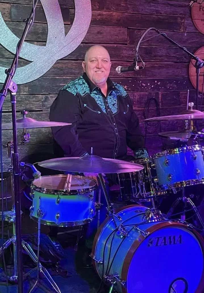 One More Round live performance and band photo