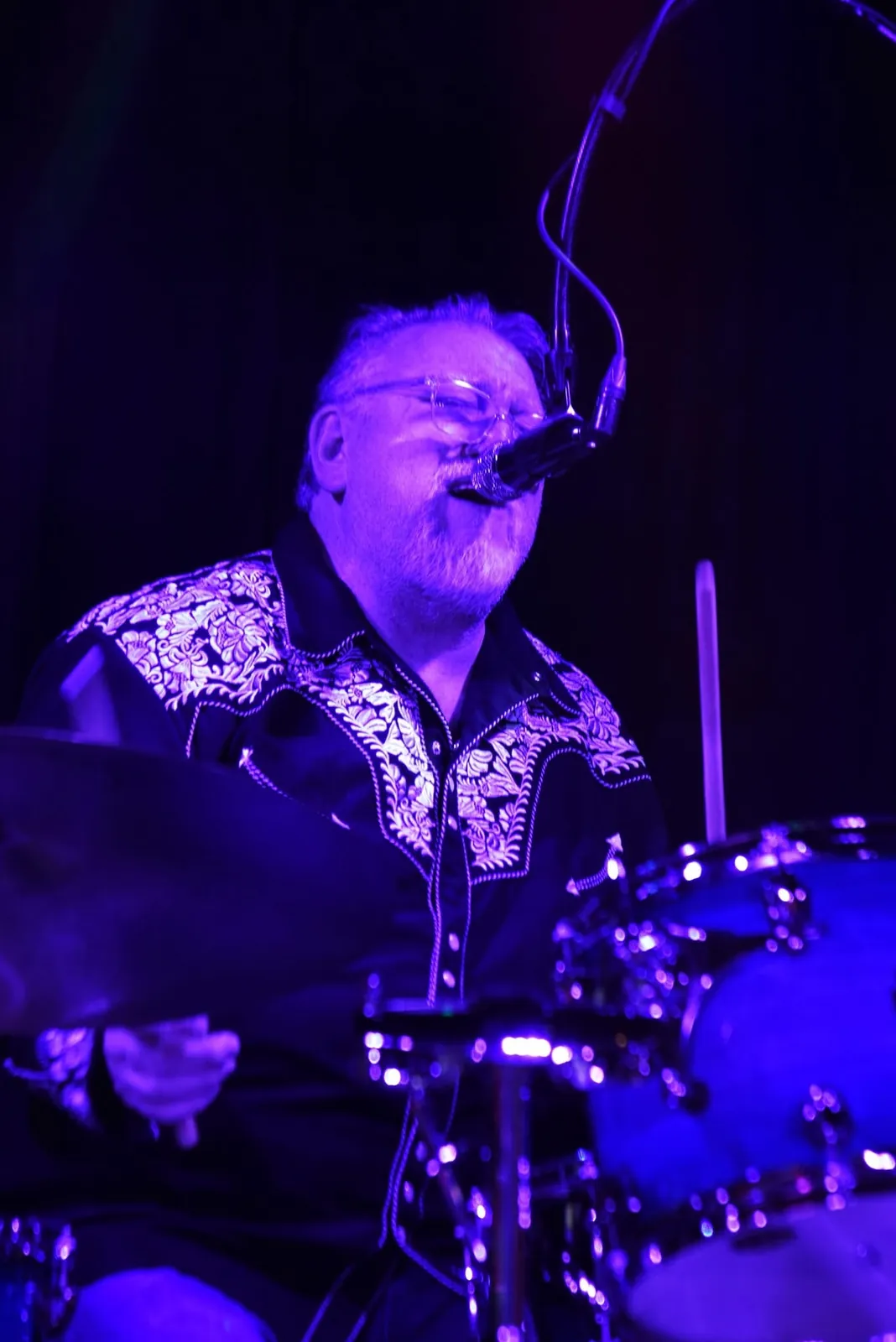 One More Round live performance and band photo