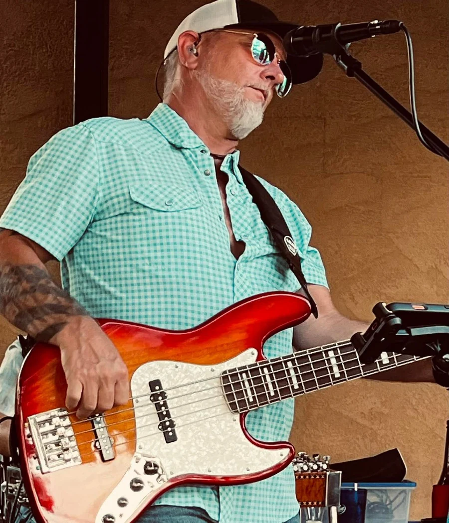 Kenny Boyd performing with bass guitar
